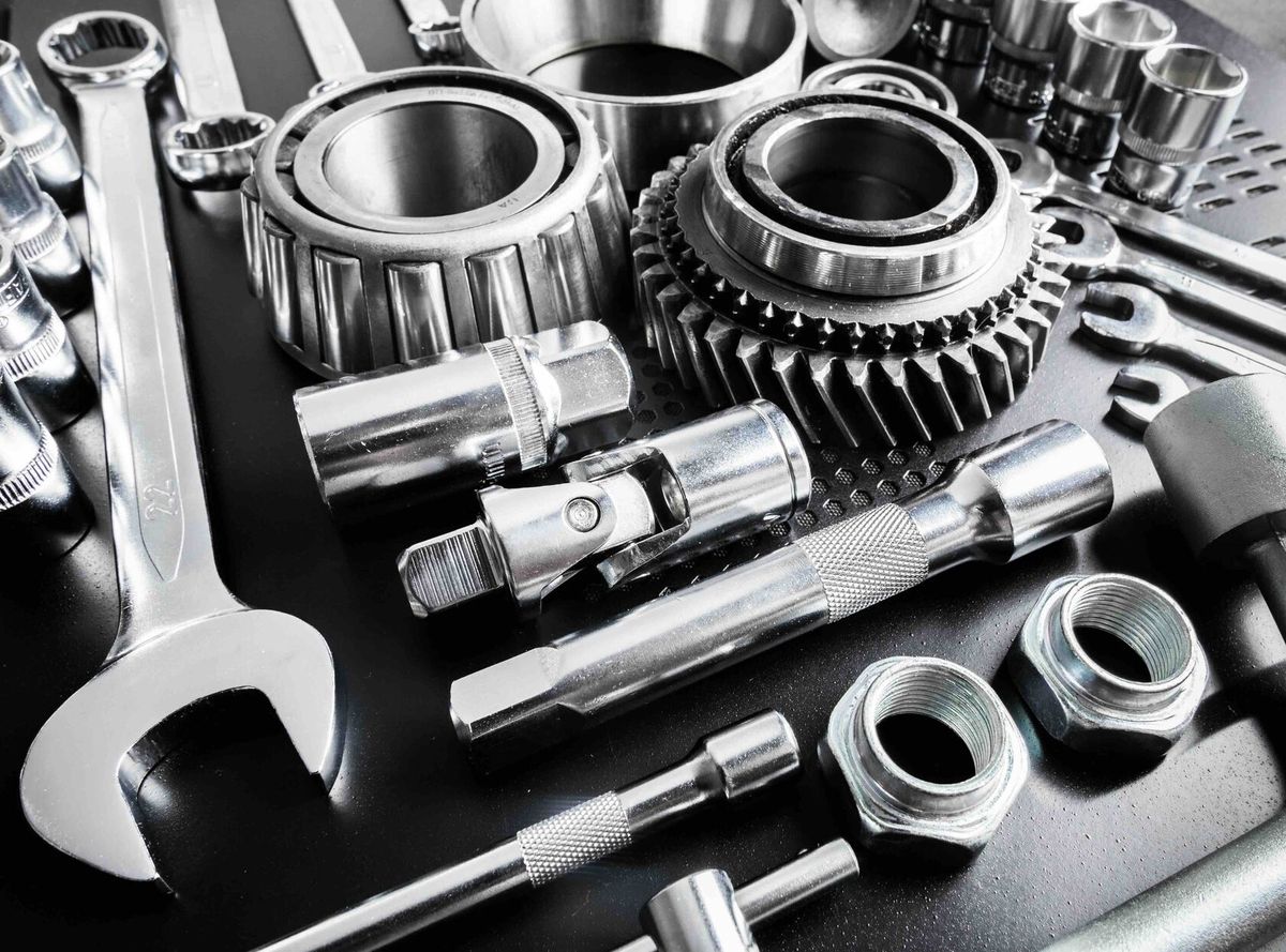 Wrench, bearings and assorted metal spare parts